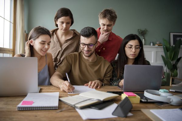 colleagues-using-laptops-notebooks-learning-study-session.jpg